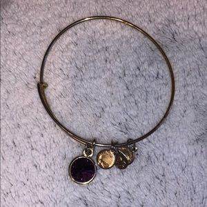 Gold Alex and ani bracelet with purple stone